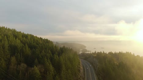 aerial view of sea to sky highway in horseshoe bay during a sunny winter sunset