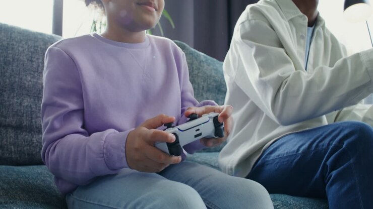Father and Daughter Playing Video Games