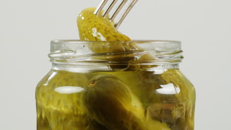 pickled cucumbers in a jar