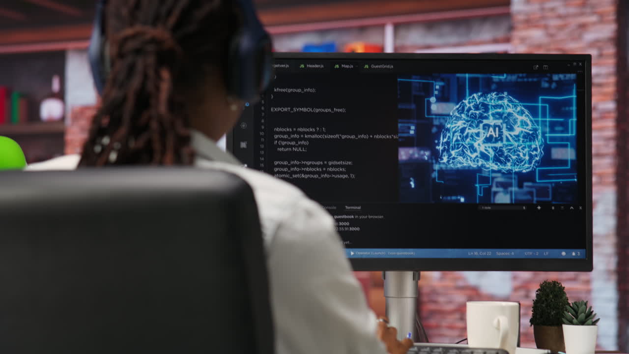 IT engineer drinking coffee, using computer at home for AI computing