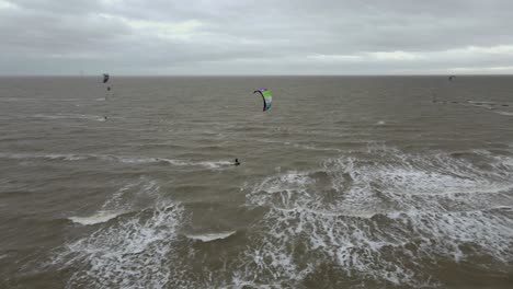 Kite-surfers-on-windy-day-in-autumn-UK-Clacton-on-sea