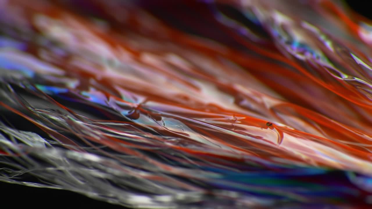 Captivating Abstract Flow: A Mesmerizing Showcase of Vibrant Colors and Dynamic Fluid Motion in Macro Perspective