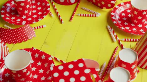 festive paper plates and cups laid in circle