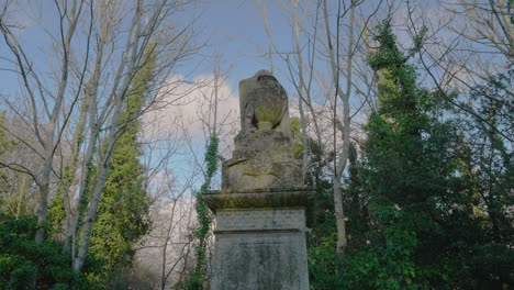 gimbal shot of a gravestone urn at an old gothic cemetery on a sunny winters day