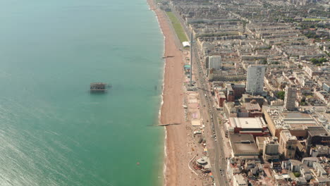 High-Aerial-shot-over-Brighton-Beach-towards-i360-and-old-Pier