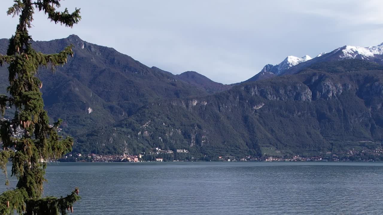 Stunning aerial view of the Italian Alps overlooking a serene lake