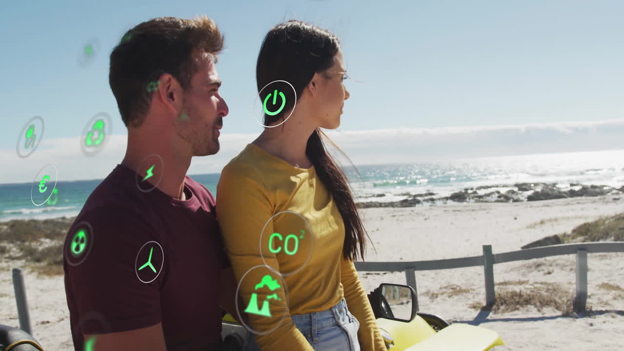 man and woman leaning against yellow car on coastal lookout, showing green energy icons