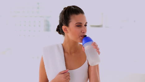 content beautiful woman drinking water