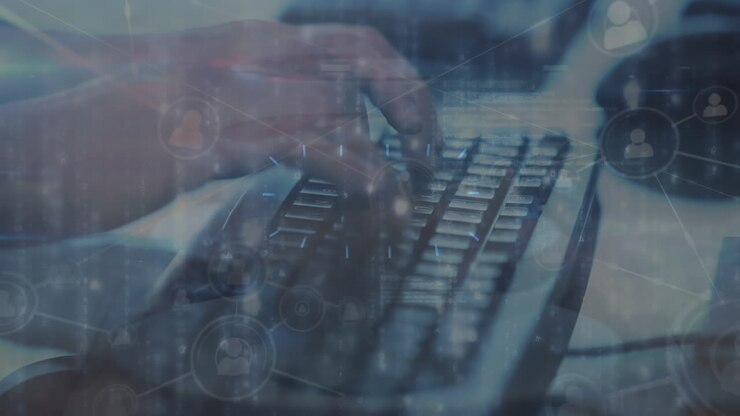 Animation of network of connections with icons over hands typing on keyboard