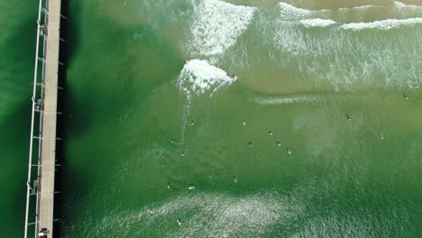 Surfers-near-jetty-on-the-Gold-Coast