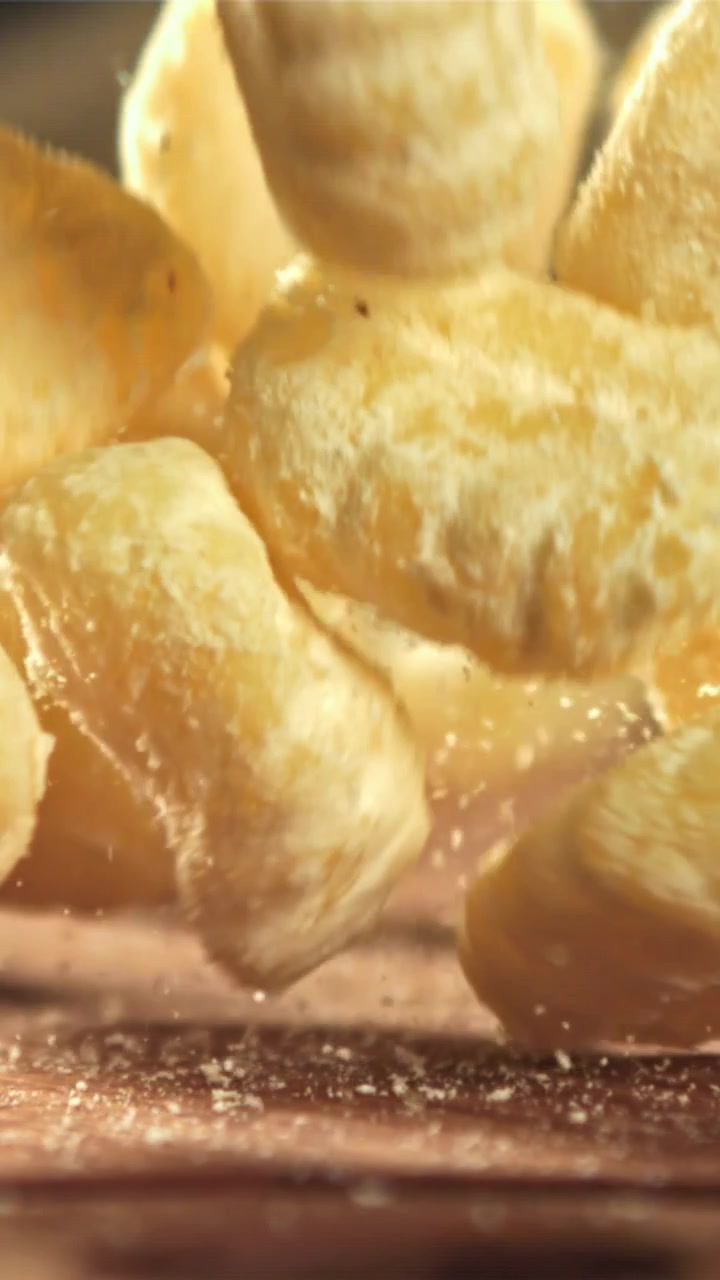 Slow Motion of Crunchy Puffed Snacks Falling with Seasoning Dust
