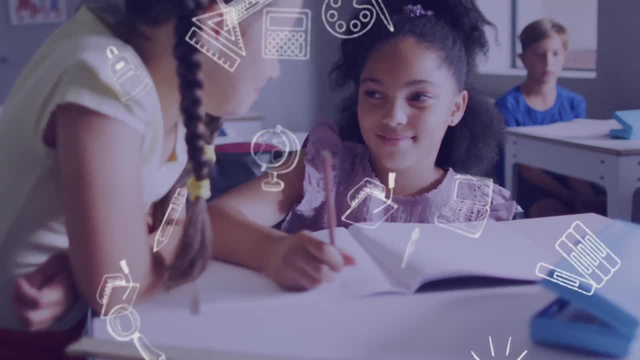 Animation of school icons over happy diverse schoolgirls talking at desk in class
