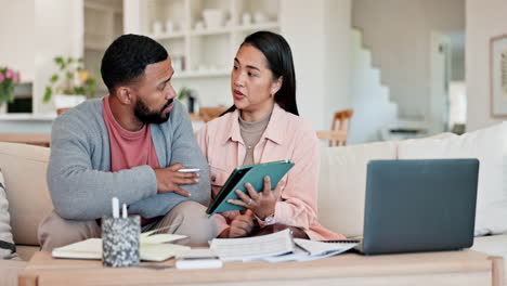 Couple,-tablet-and-planning-on-sofa-for-home