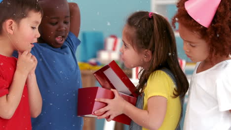 animation of white shapes over children at birthday party
