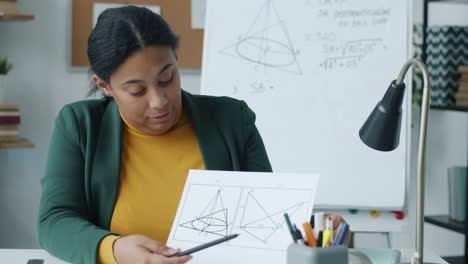 teacher explaining geometry concepts