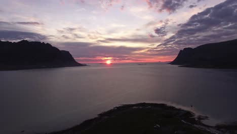 Aerial-of-a-fjord-at-sunset-on-Lofoten,-Norway