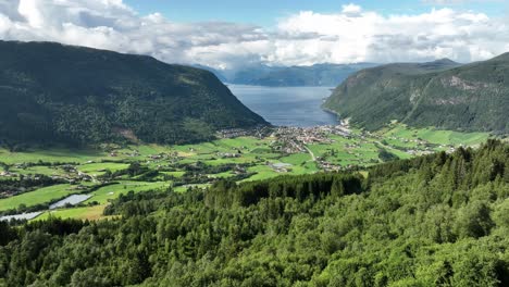 stunning village of vik in sogn presented from storesvingen viewpoint along road - summer aerial