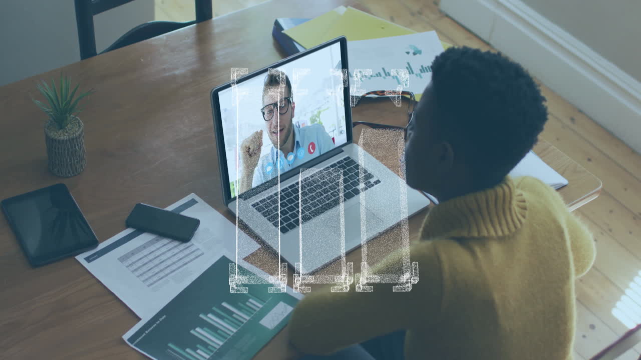 Video conferencing on laptop, child analyzing data charts on school table