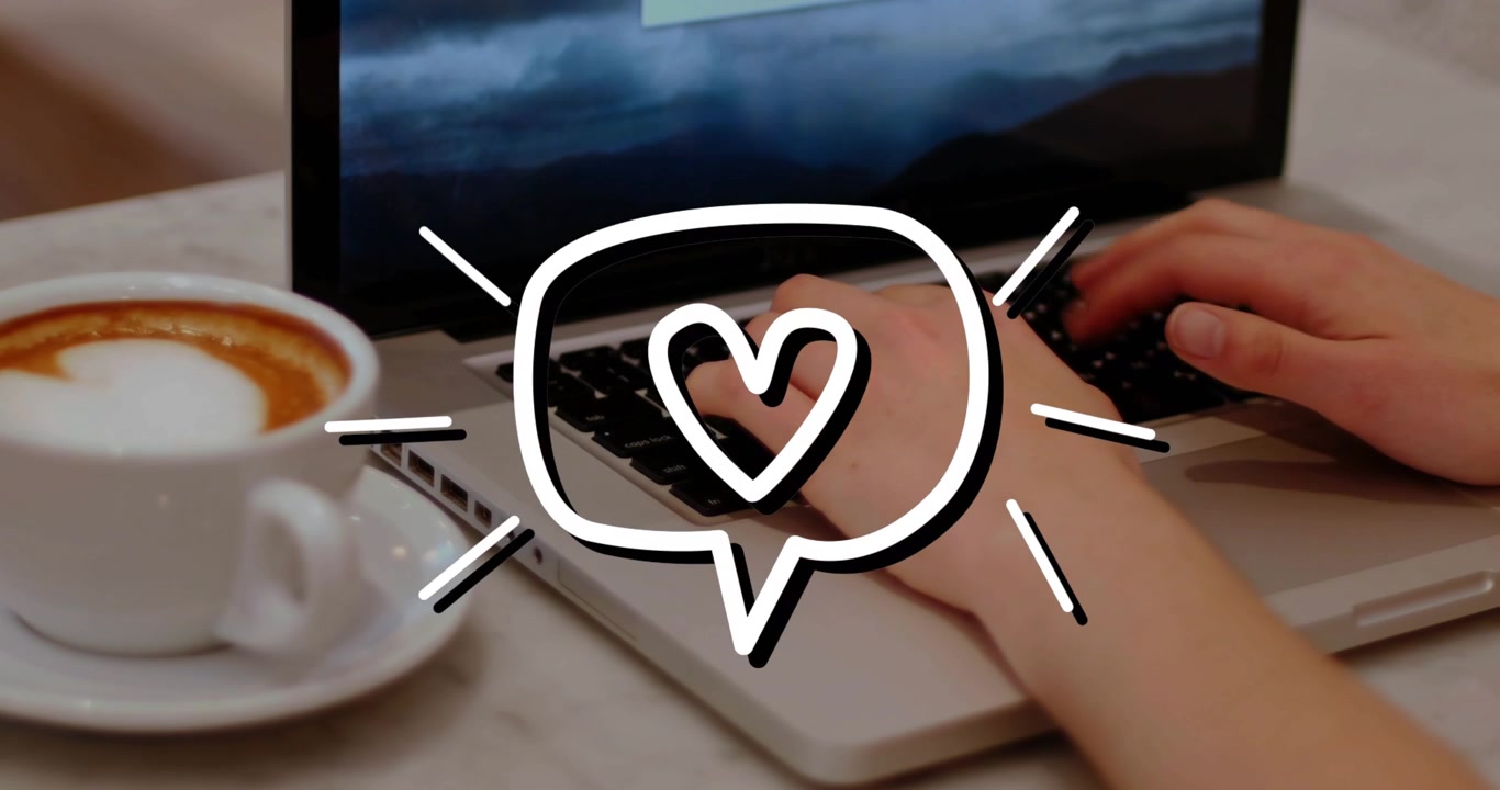 Adult hands landing on laptop keys causing heart bubble radiating lines typing to convey affection