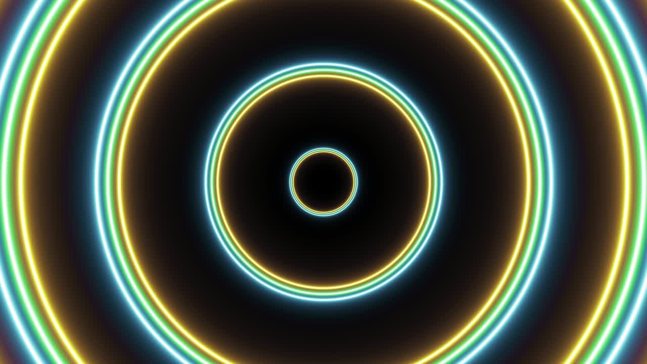 vuelo futurista abstracto en gráfico de movimiento de túnel. grupo de círculos azules, verdes y amarillos animación de bucle sin costuras en un fondo oscuro