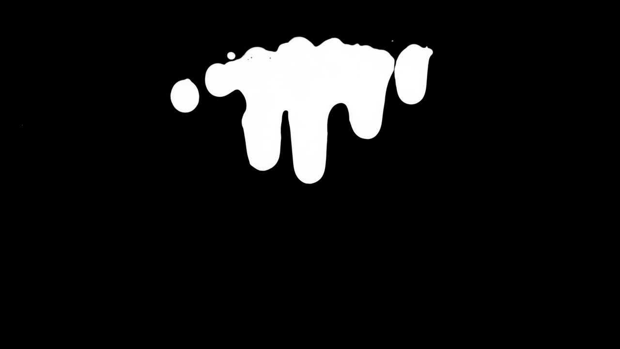 검은 화면 배경 위에  잉크가 흘러내린다