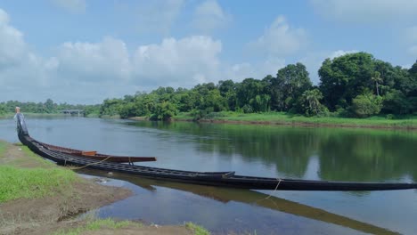 the aranmula uthrittathi vallamkali or aranmula boat race wooden snake boat in aranmula ,kerala
