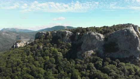 Drone-shot-in-front-of-high-mountain-cliffs