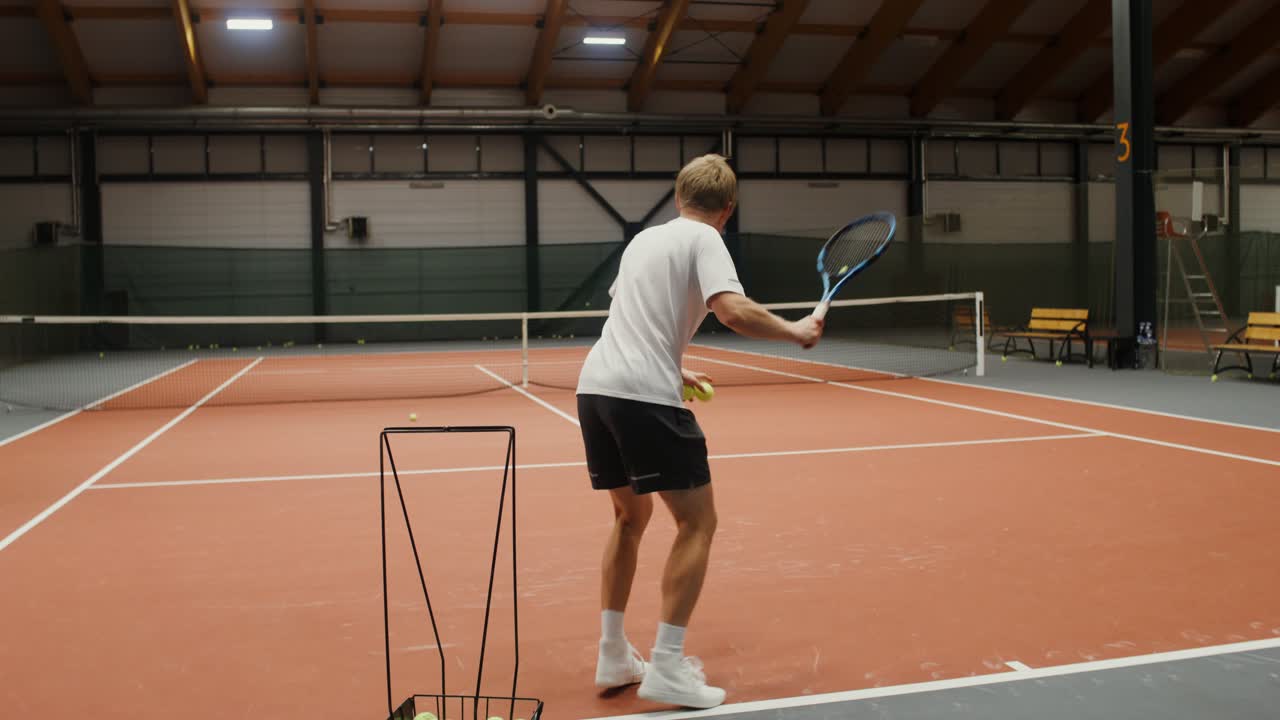 Man Playing Tennis Indoor