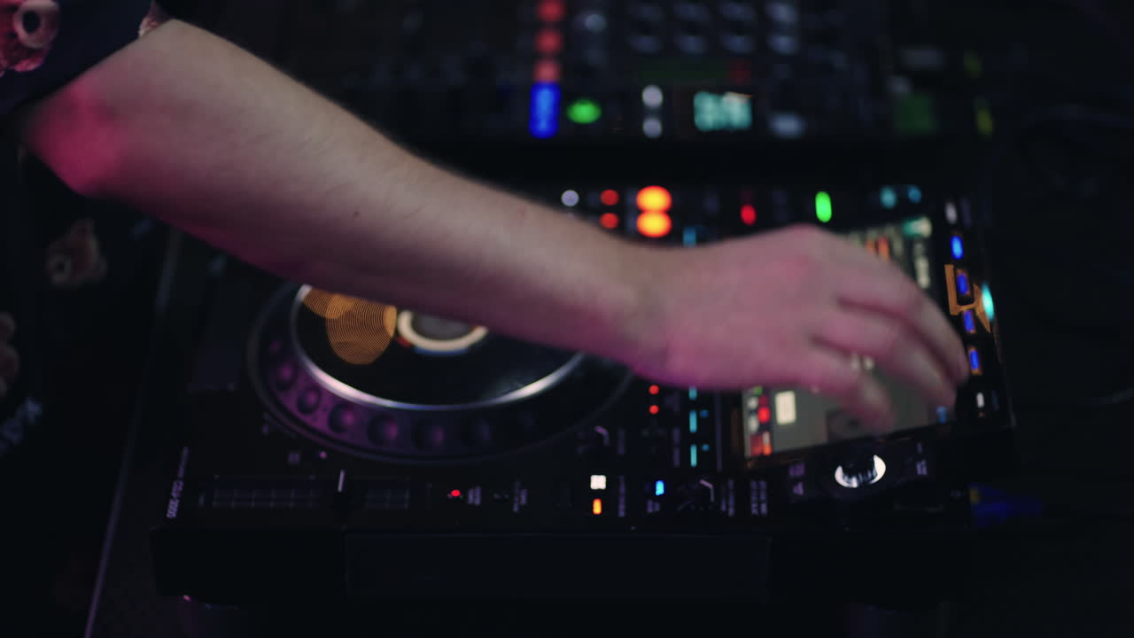 DJ Mixing Music at a Nightclub