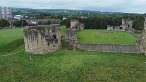 flint castle welsh medieval coastal military fortress ruin aerial view rotation right low angle