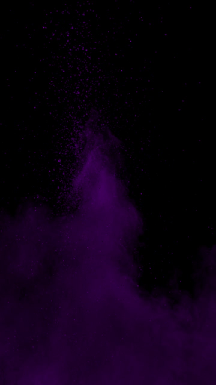 Super Slow Motion Shot of Purple Color Powder Explosion at 1000Fps Vertical View
