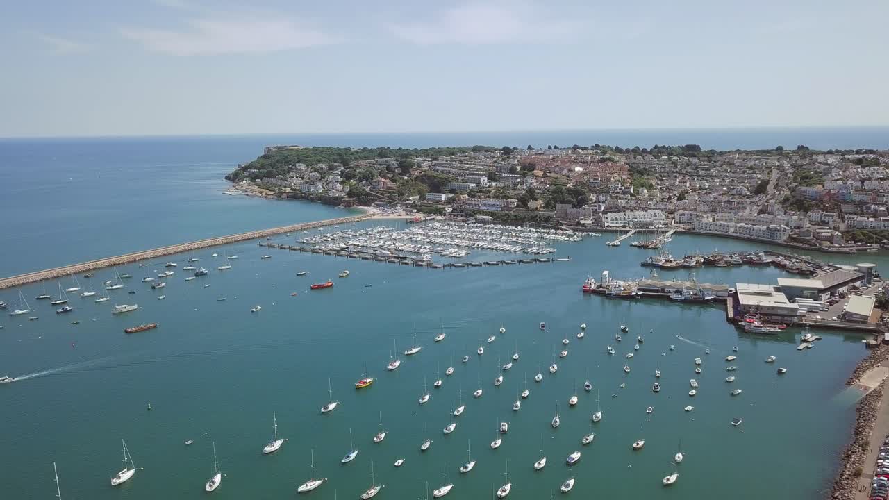 Aerial view of a marina and coastal town