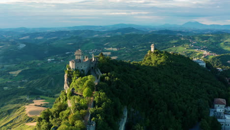 san marino sunrise, aerial flying over cliff fortresses