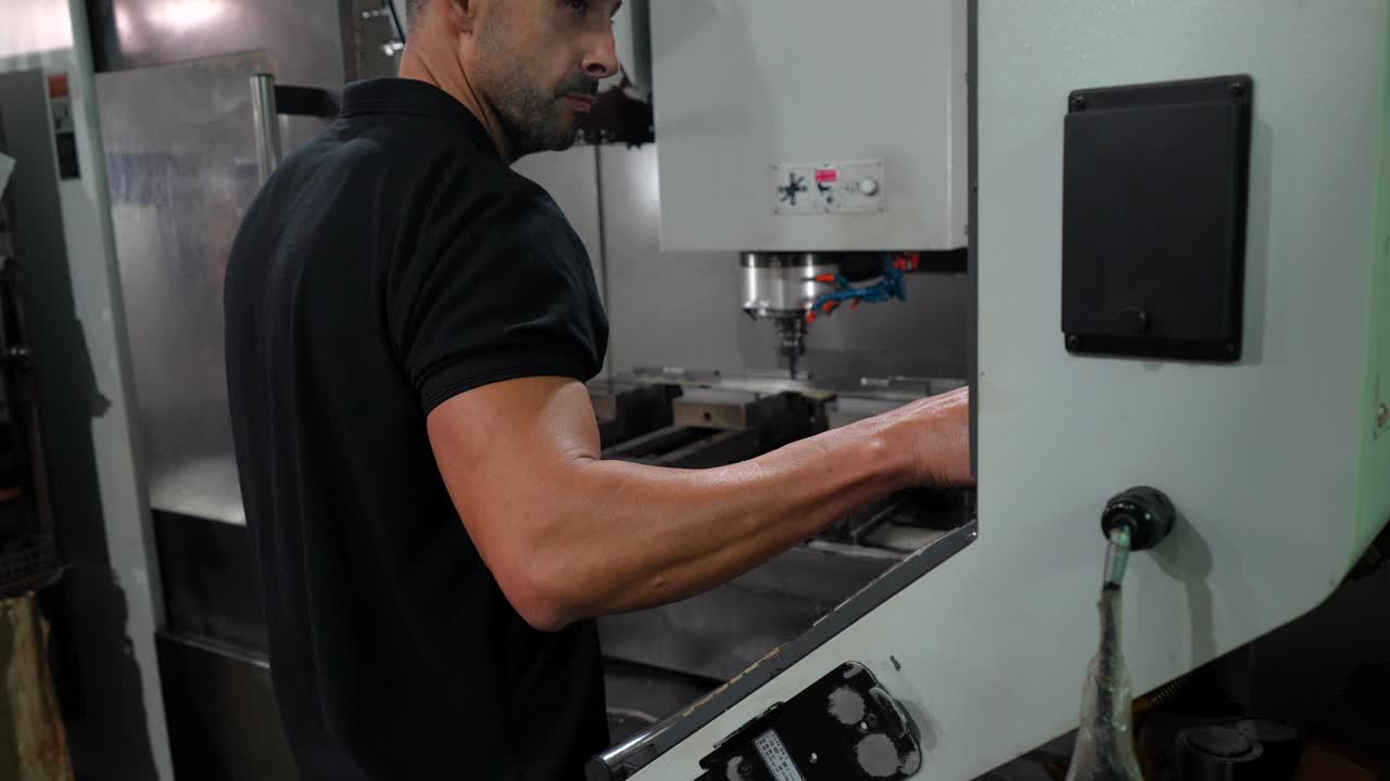 Operating a CNC Machine in a Metalworking Shop