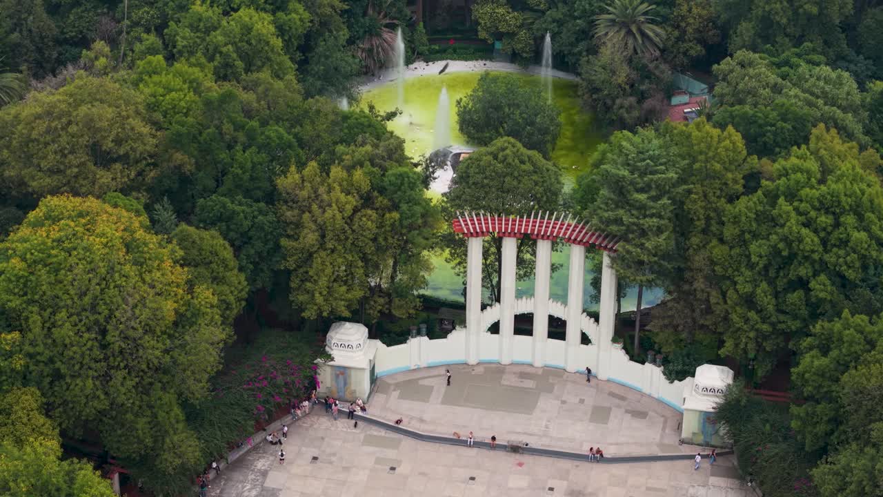 Drone shot capturing Foro Lindbergh and lake in Parque México, Condesa, Mexico City