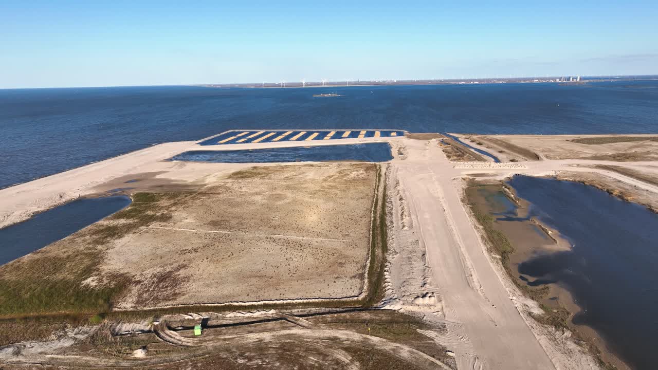 Aerial footage of reclaimed land where a new neighborhood is being built to the east of Amsterdam