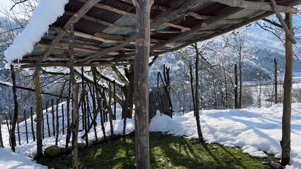 green grass area in the middle of heavy snow rural landscape mountain forest iran nature countryside aerial alpine austria background bavaria drone europe farm field hiking meadow peak scenery travel