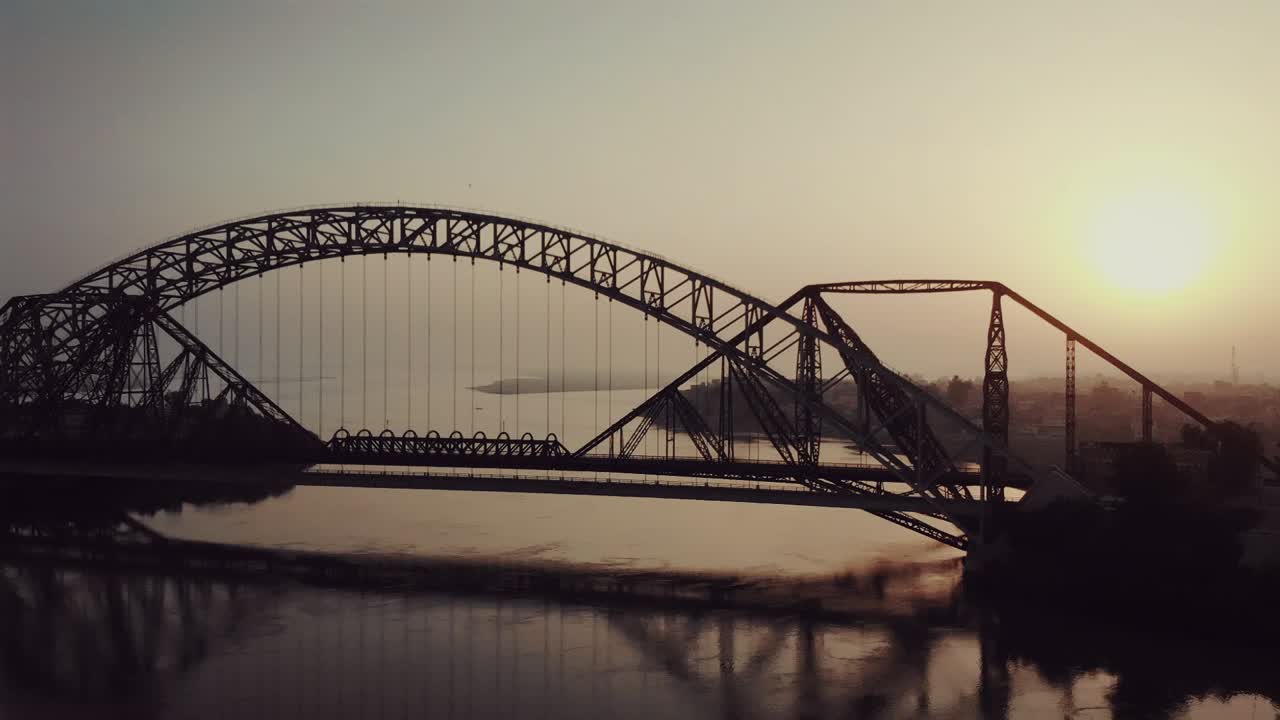 View Of Lansdowne  And Ayub Bridge Over Indus River During Evening Light. Aerial Follow Shot Left