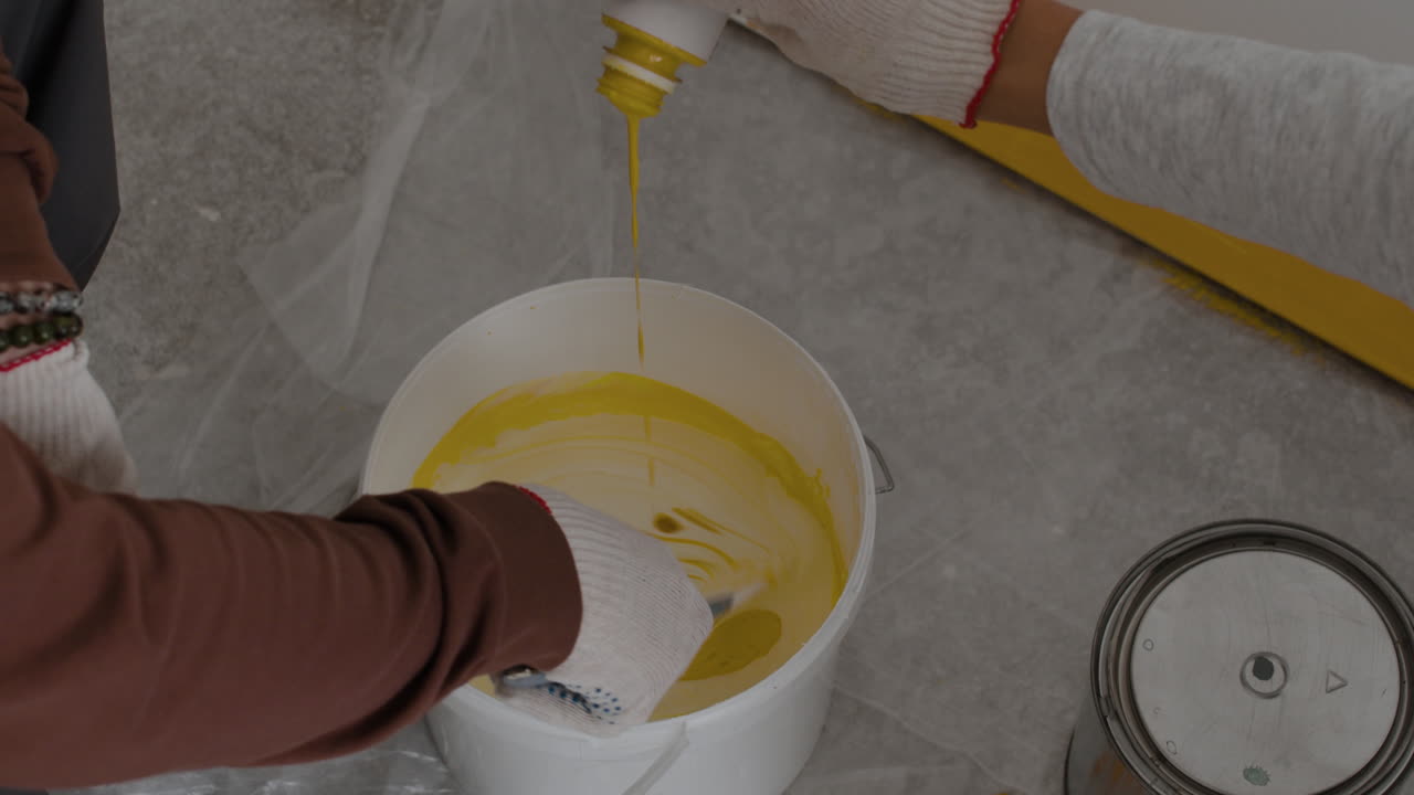 Mixing Yellow Paint: A DIY Home Improvement Project