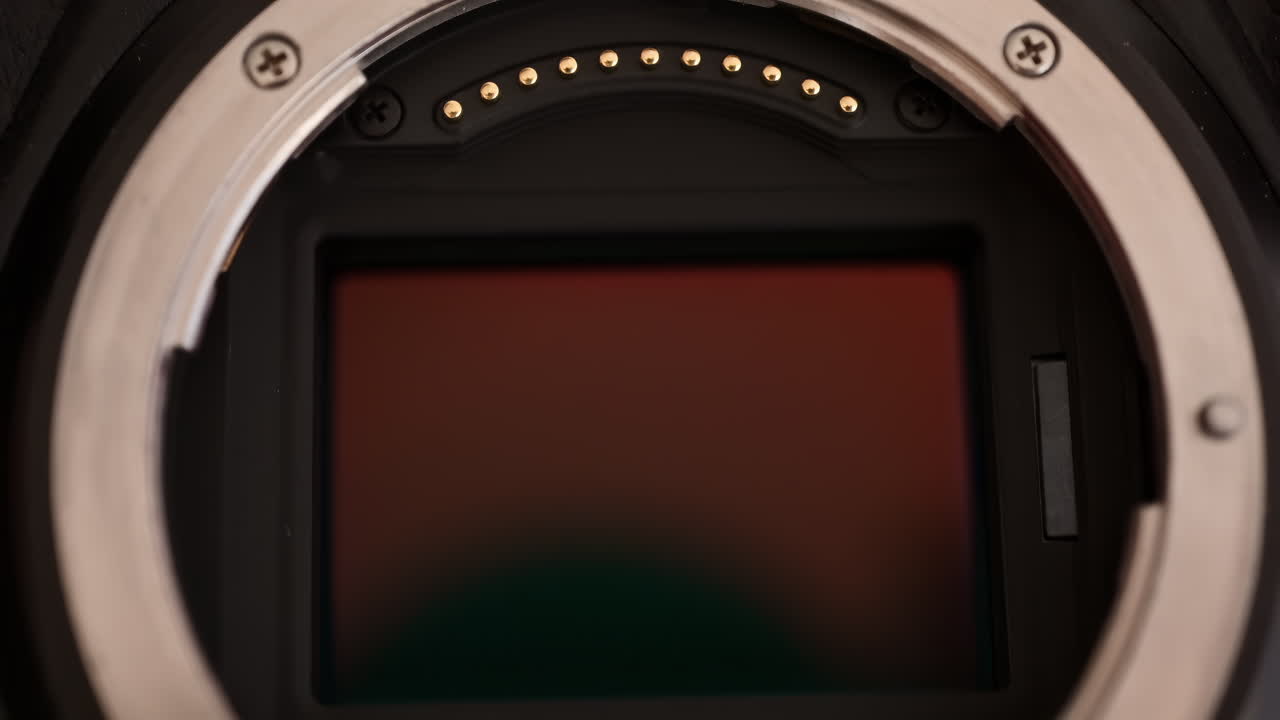 Close up view of a digital camera shutter opening