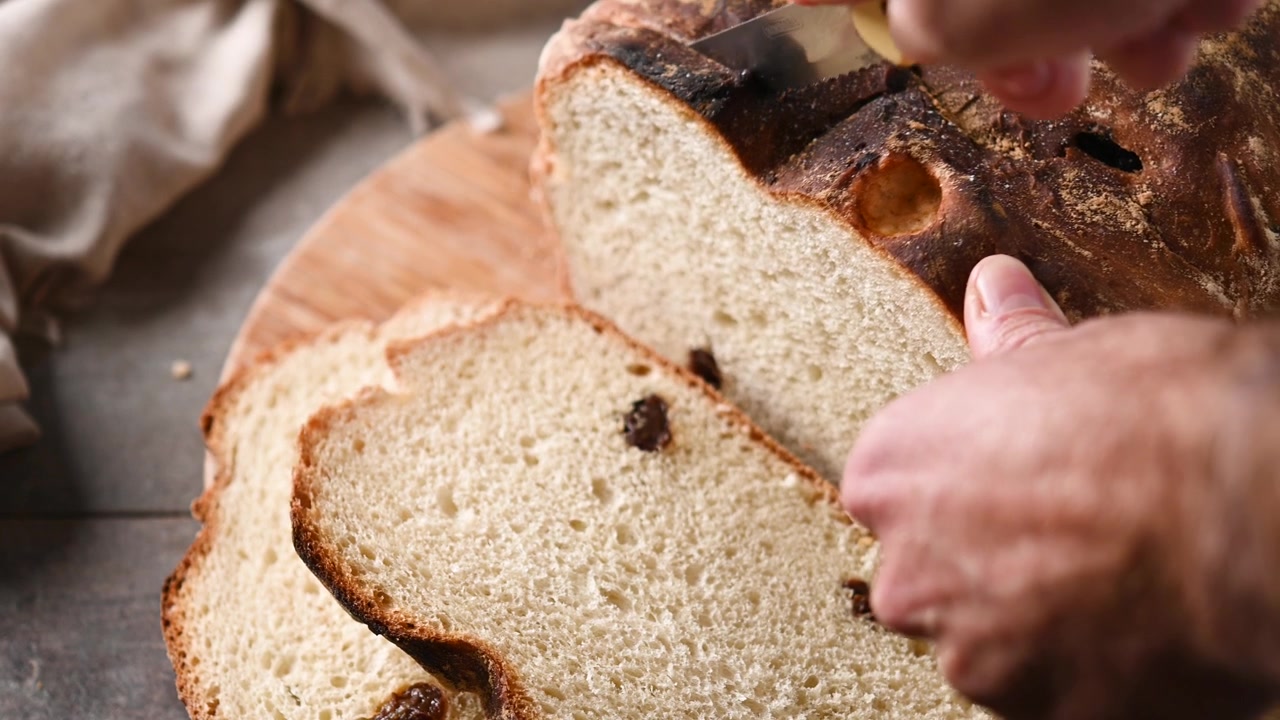 Cutting Irish Soda Bread for St Patrick’s Day