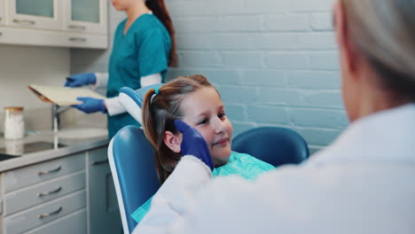 little girl at the dentist's office