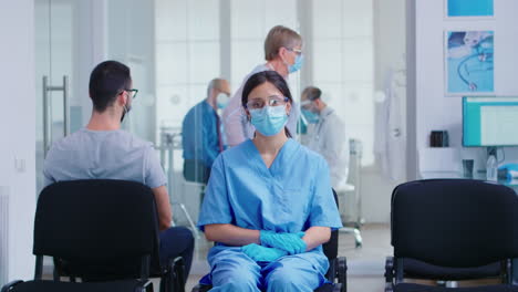 worried nurse with face mask against coronavirus