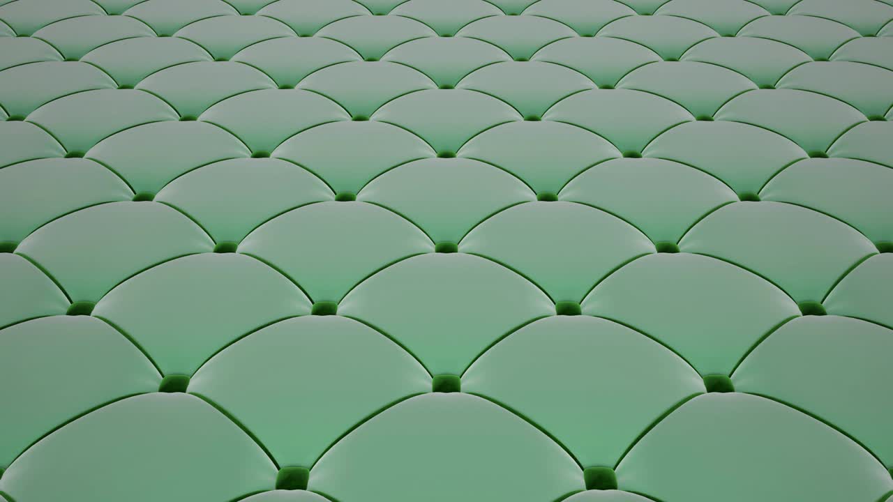 3D animation of the flight over a light green quilted velvet surface with green drawstrings. Looped video.