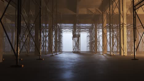 Interior-of-the-reinforced-concrete-building-construction-site.-One-of-the-floor-with-metal-scaffolding.-Camera-moving-sideways-in-an-endless-loop.-Perfect-for-development-related-purposes.