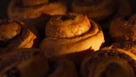 delicious cinnamon rolls freshly baked in oven. closeup, rotating shot