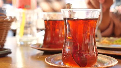 closeup of a glass of turkish tea on a table