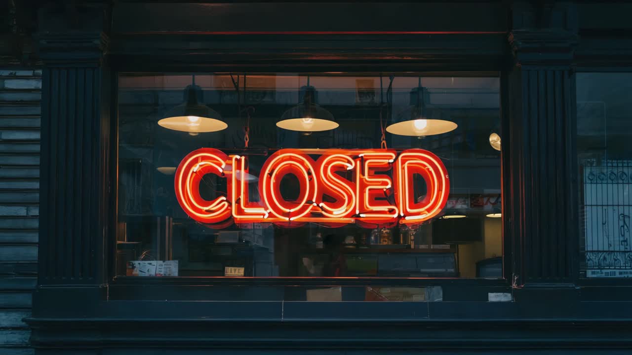 Closed Neon Sign in a Shop Window