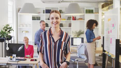 Business-woman-smiling-at-the-camera