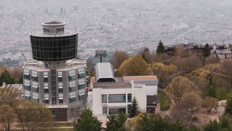 city view from mountain in tirana, showing buildings and nature